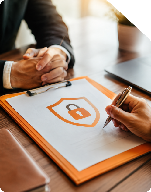 Legal Non-Disclosure Agreement document on an orange clipboard signed with a pen, featuring an orange security padlock shield icon next to two corporate professionals clasping hands